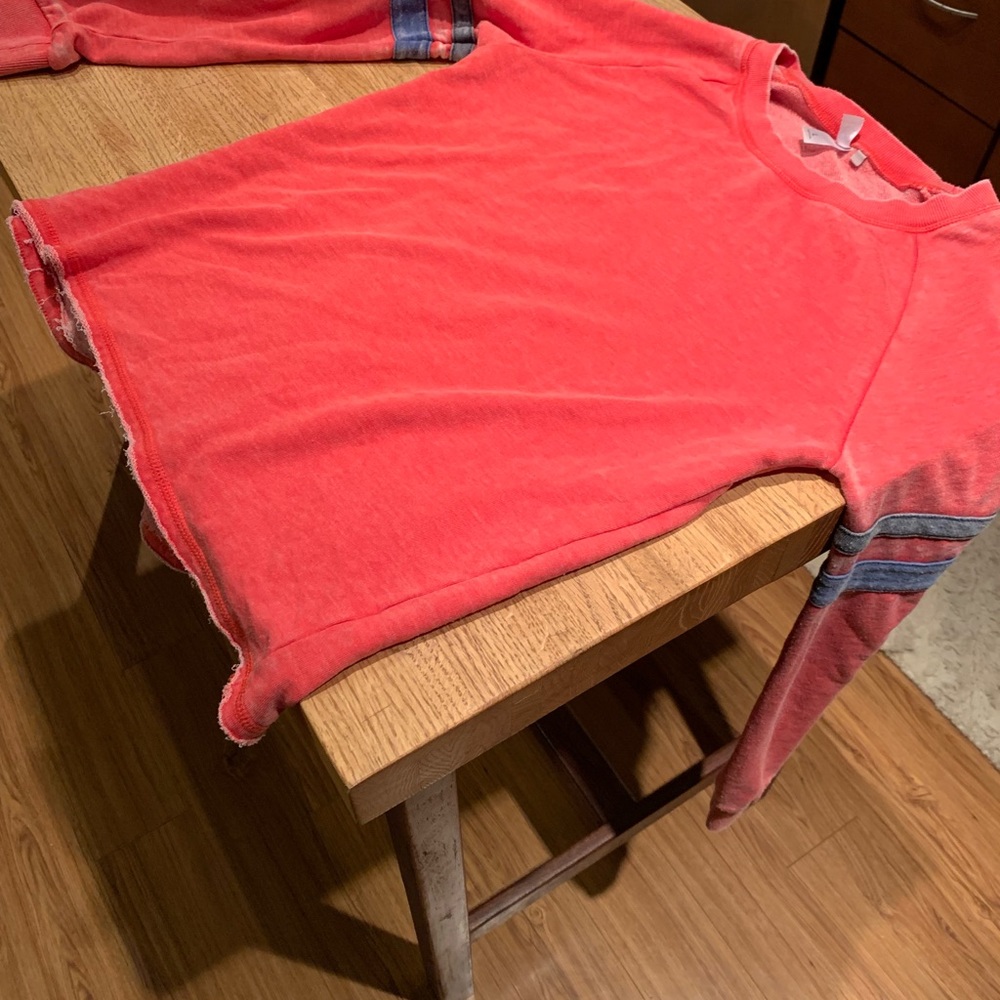 Never worn sweatshirt. Red with blue stripes